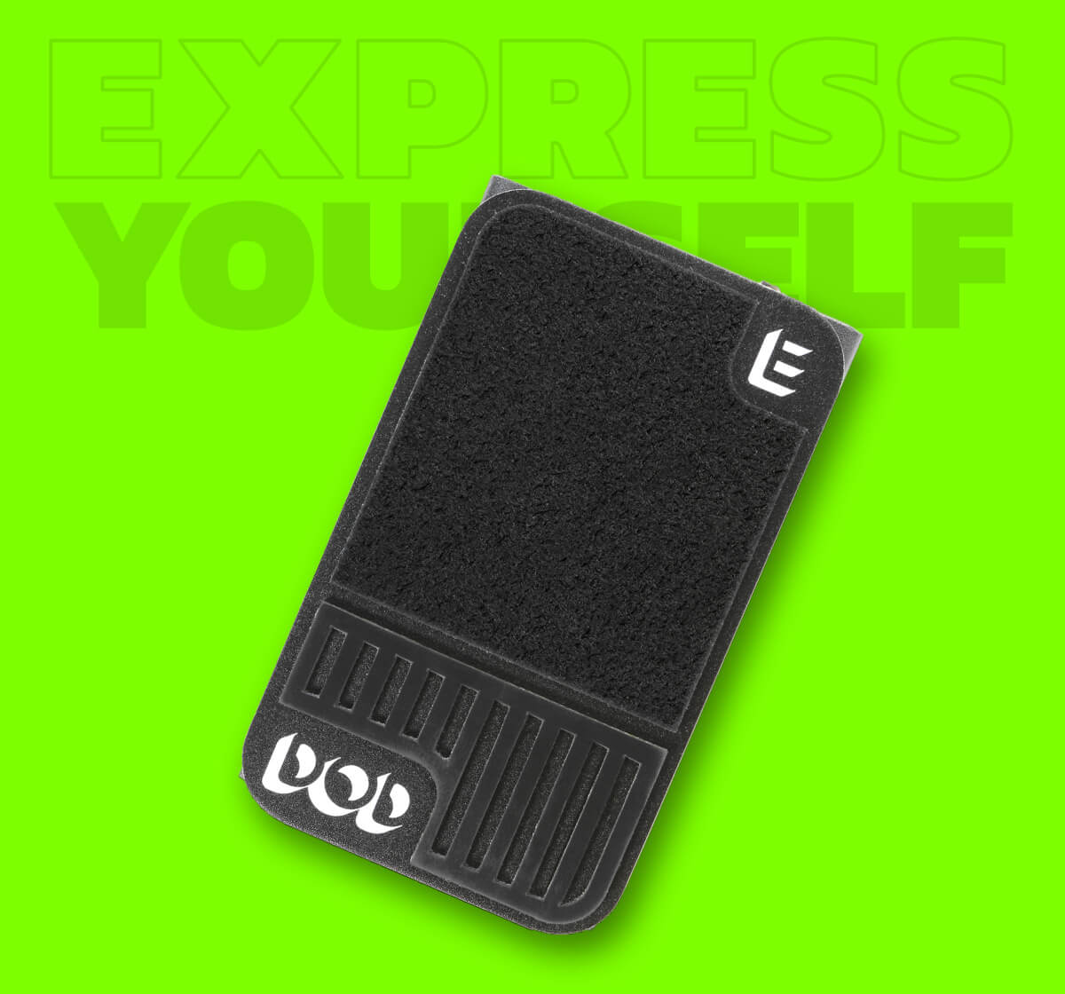 DOD Mini Expression ultra compact expression guitar pedal in black with green background and graphics that says 