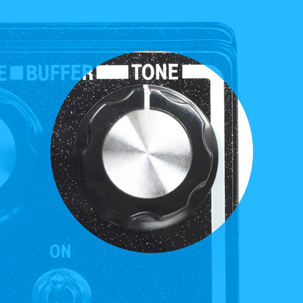 DOD Bifet Boost 410 boost + buffer pedal tone control close up.