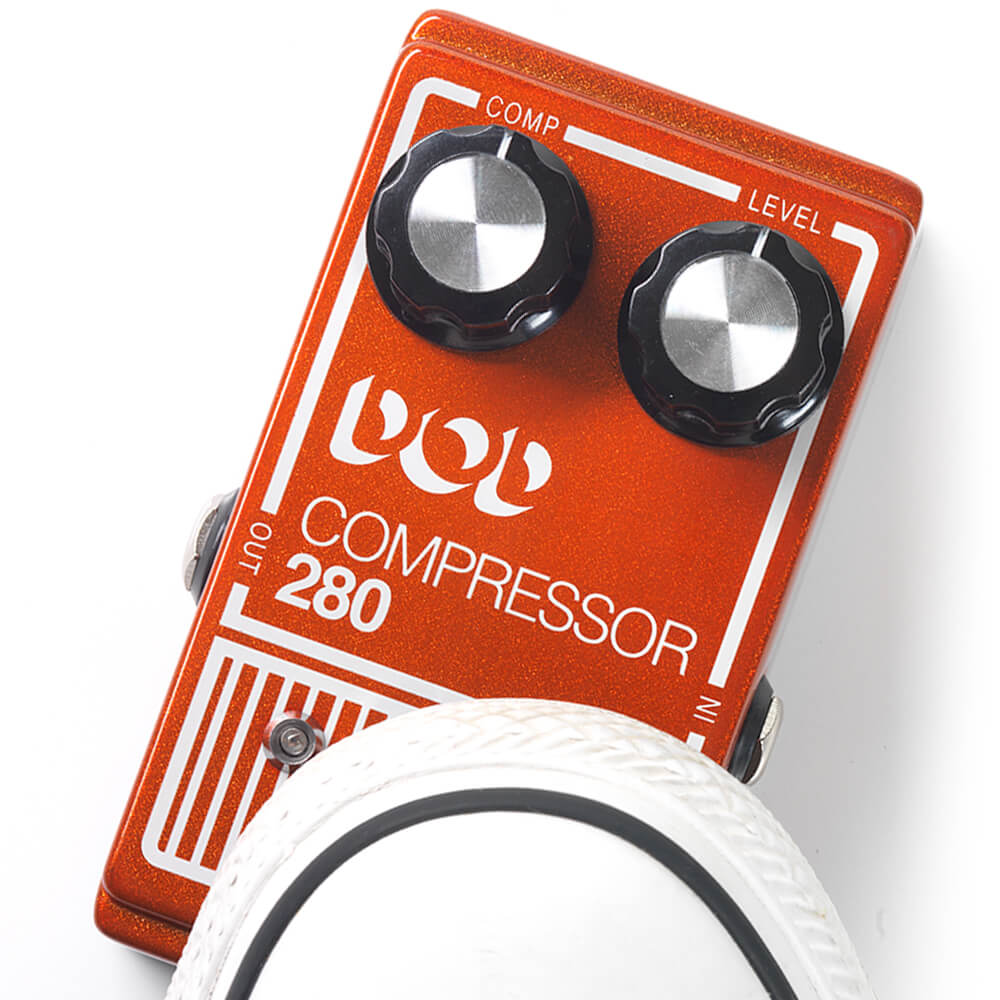 DOD Compressor 280 guitar pedal with shoe pressing footswitch