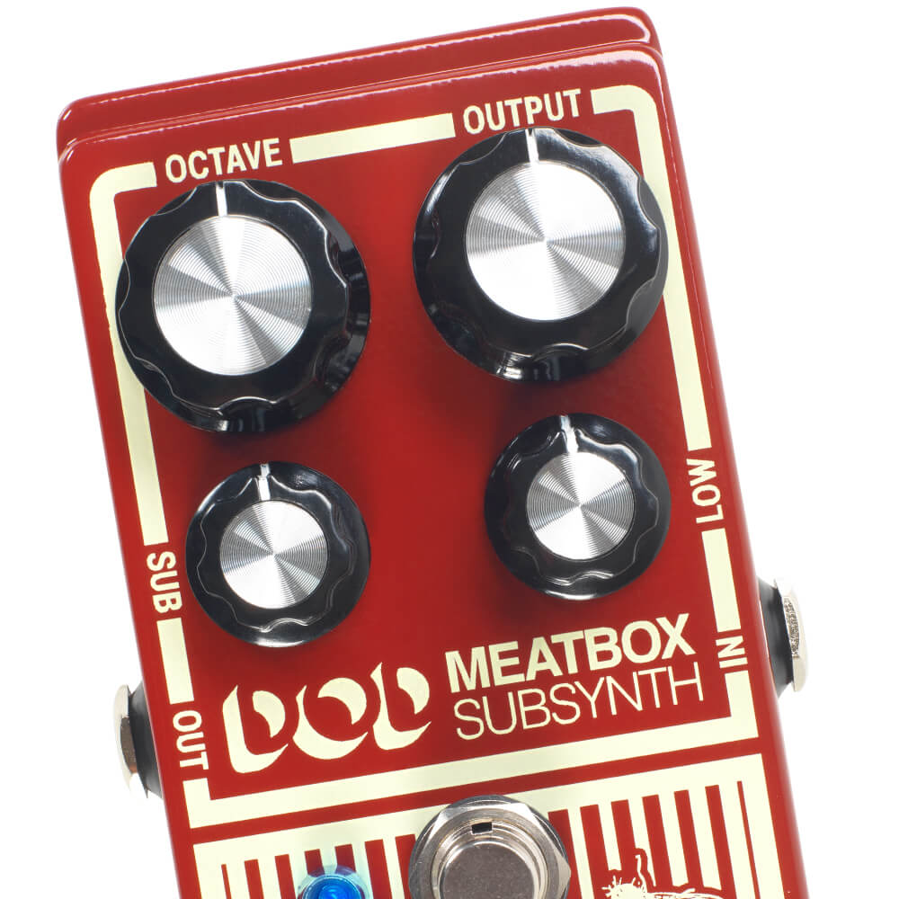 close up of DOD Meatbox distortion guitar pedal knobs for Octave, Output, Sub, and Low