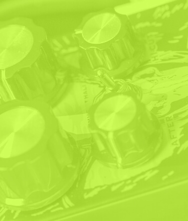 DOD Carcosa Fuzz analog fuzz guitar pedal close up in a transparent green